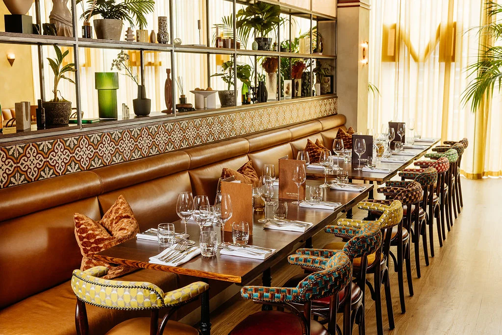 Maison by Glaschu — Parisian-bistro interior with burgundy banquette, Princes Square Glasgow